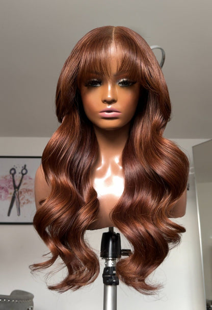 Dark Copper Blonde with Curtain Bangs