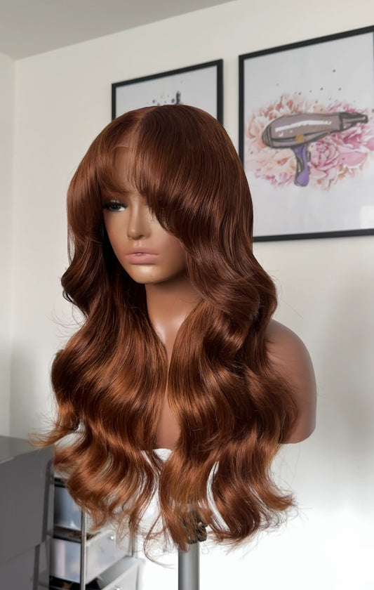 Dark Copper Blonde with Curtain Bangs