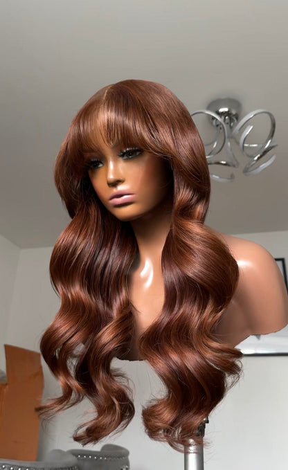 Dark Copper Blonde with Curtain Bangs