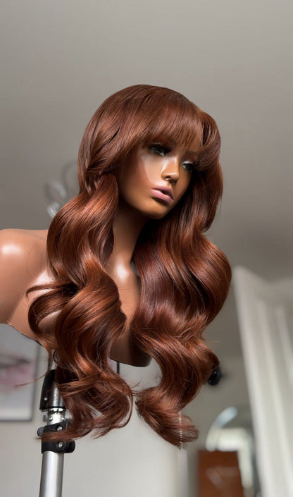 Dark Copper Blonde with Curtain Bangs